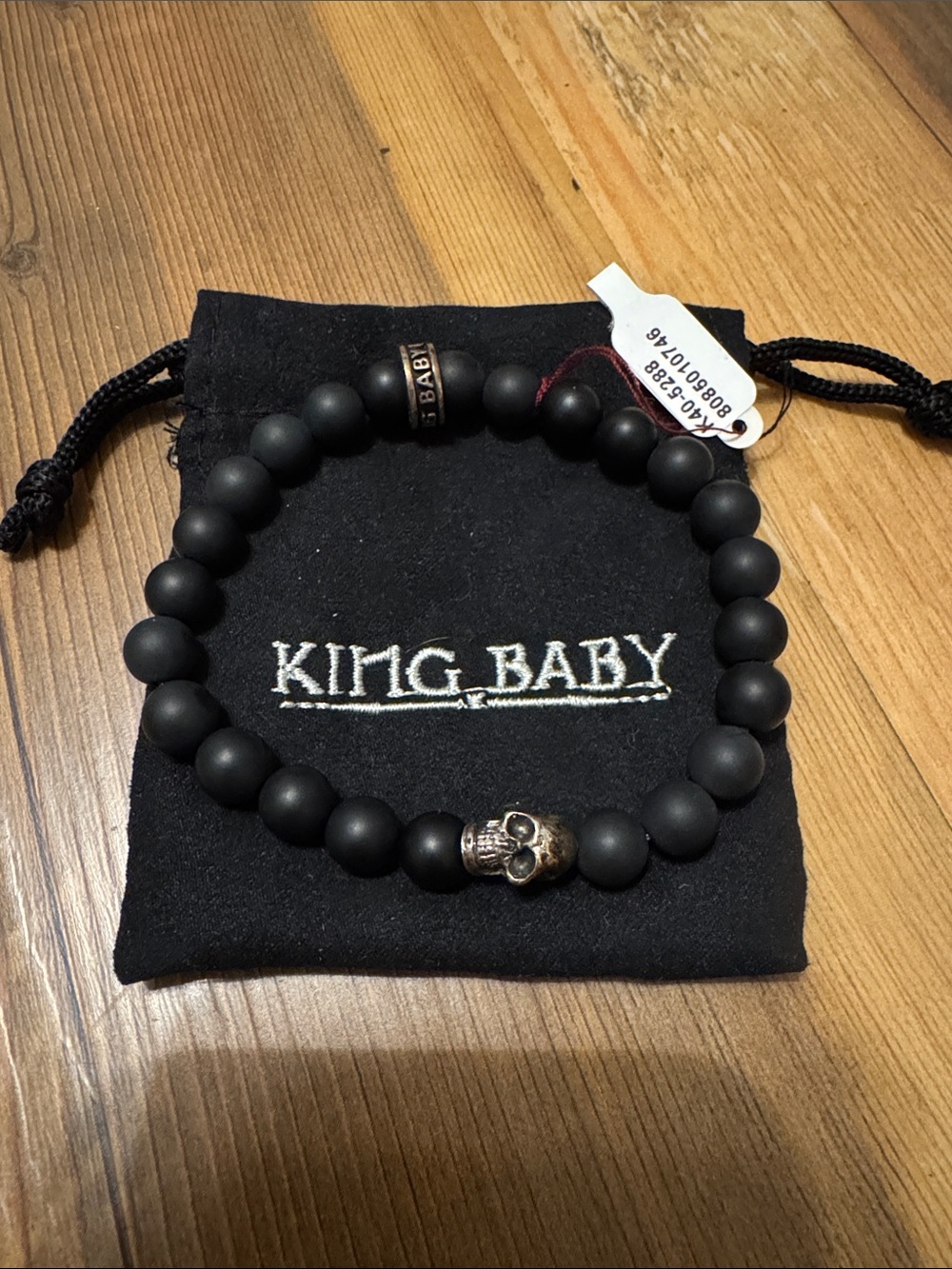 Men's Matte Black Beaded Bracelet with Skull Accent
